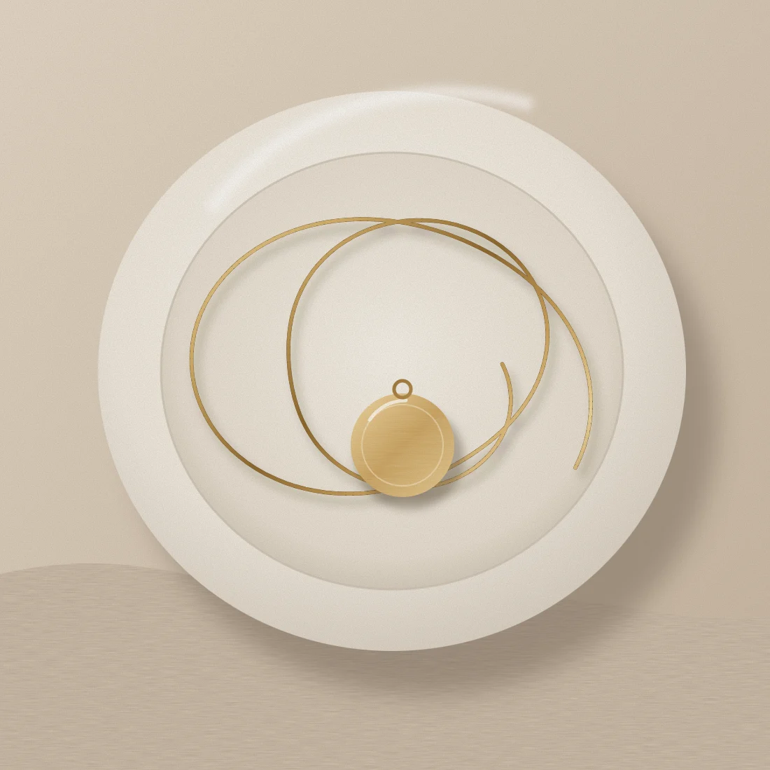 Fine gold-tone pendant and chain arranged on a pale ceramic dish